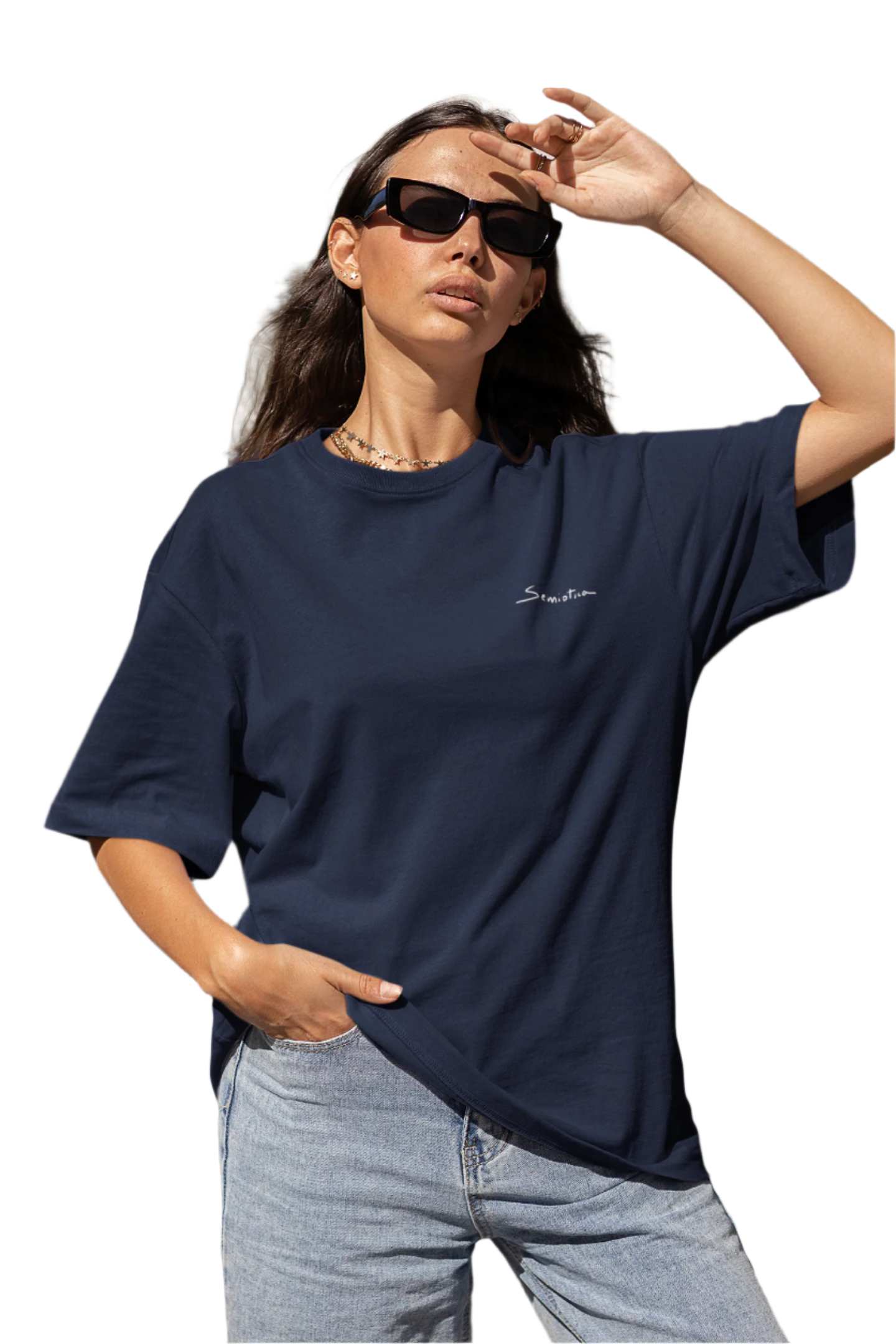 Female model wearing navy oversized t-shirt with subtle Semiotica logo on the front.