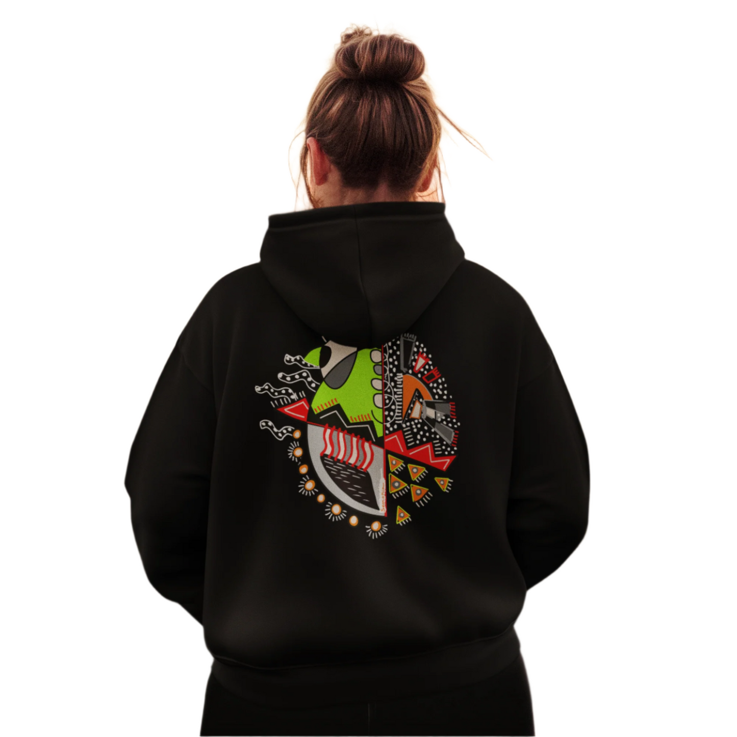Woman wearing the black "Warrior of Light" hoodie, highlighting the bold symbolic back print artwork.