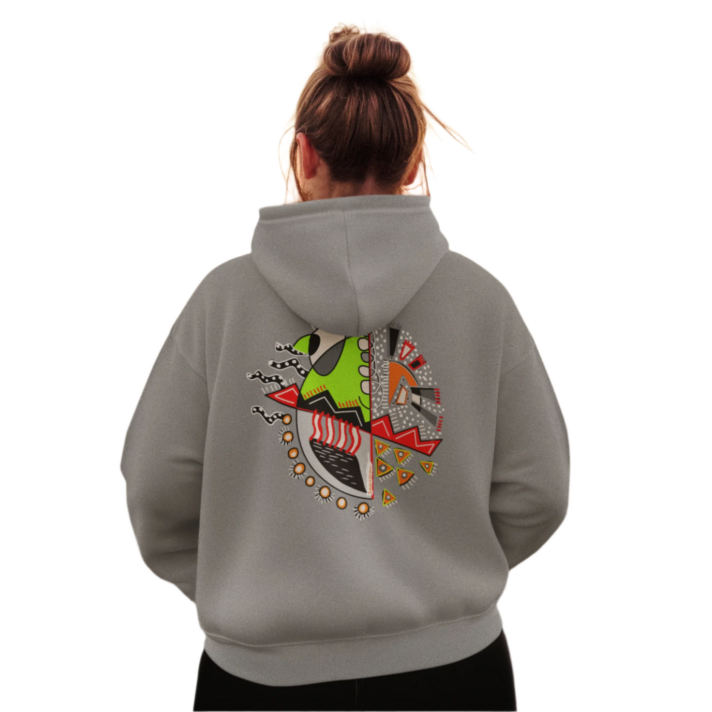 Woman wearing the gray "Warrior of Light" hoodie with a clear view of the bold and symbolic back print design.