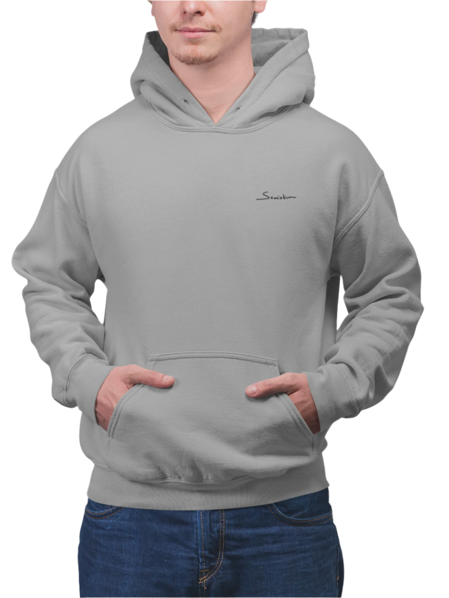 Man in the gray "Warrior of Light" hoodie showing the front view with a minimalist Semiotica logo and relaxed fit.