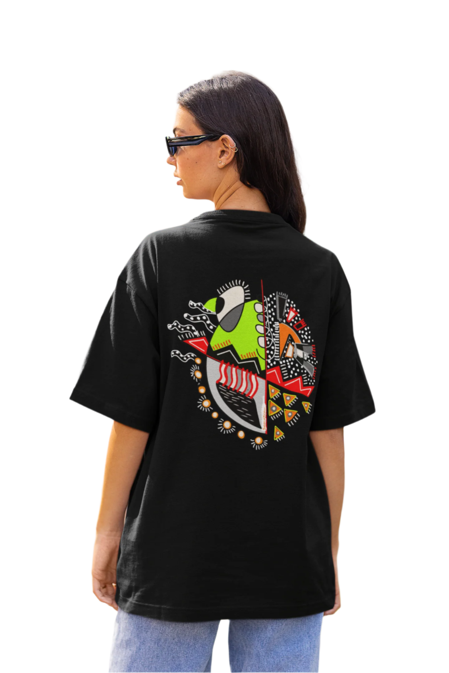 Woman wearing the "Warrior of Light" oversized T-shirt with a clear view of the expressive graphic design on the back.