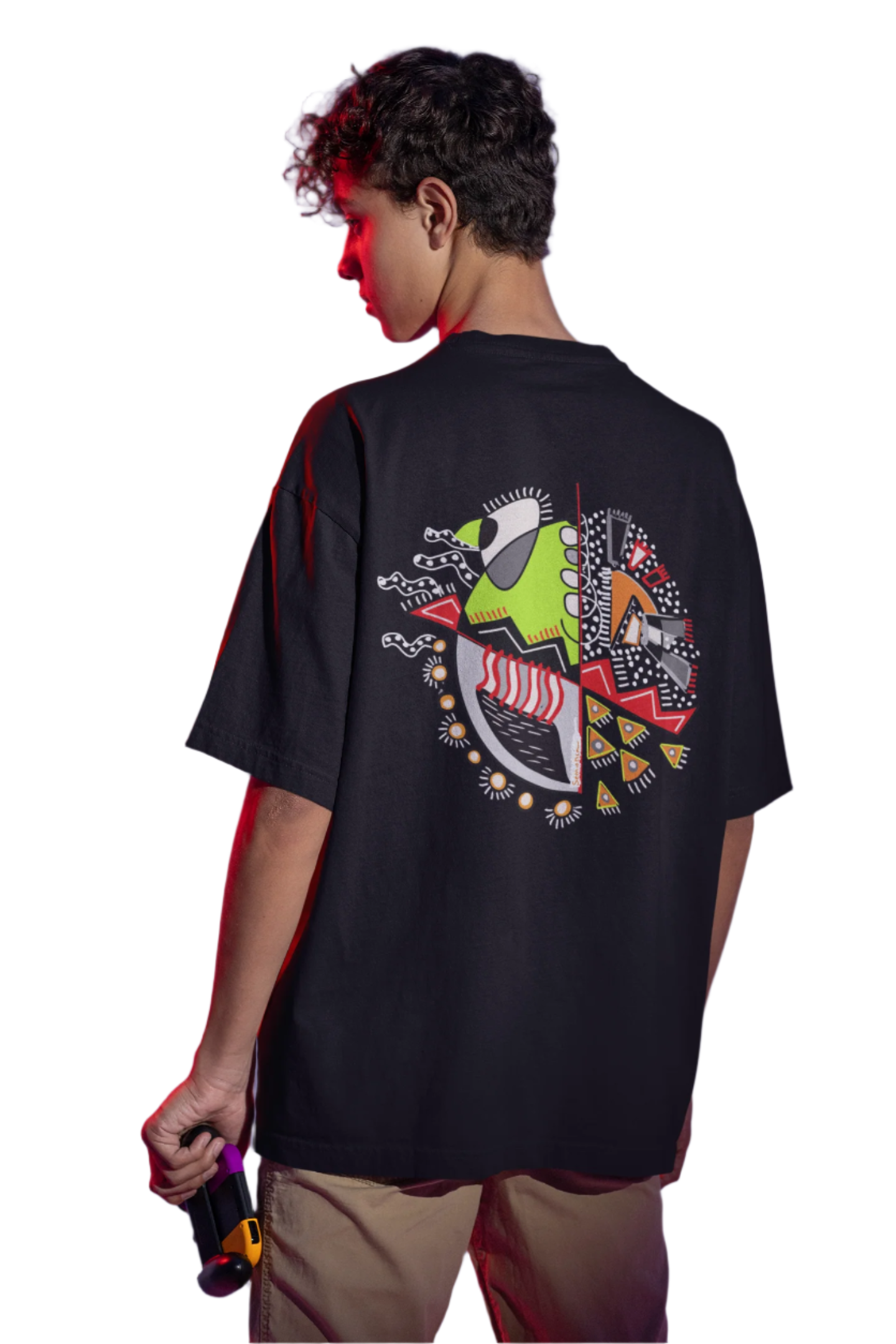 Man wearing the "Warrior of Light" T-shirt with focus on the colorful and symbolic back artwork.