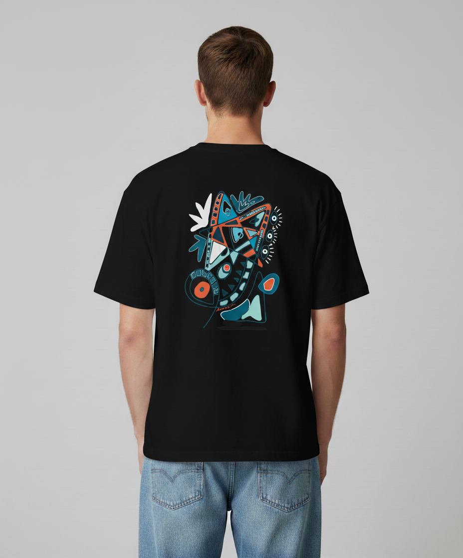 Man wearing a black t-shirt from Semiotica with a colorful design on the back against a gray background