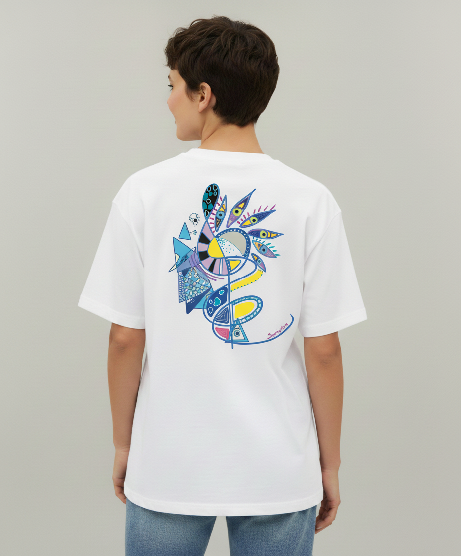 Woman wearing a white t-shirt from Semiotica with a colorful abstract design on the back against a plain background